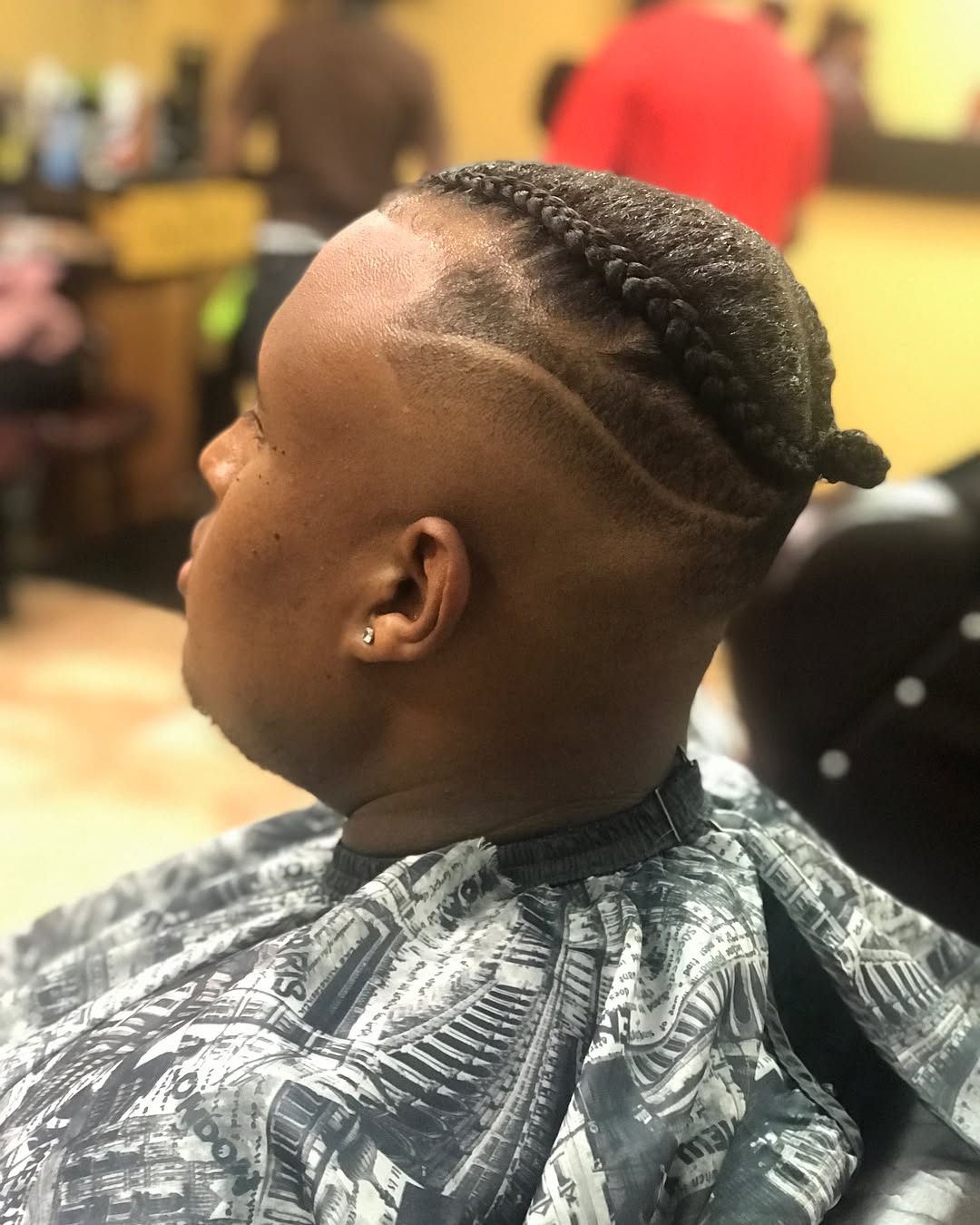 Braided mohawk with carved A design