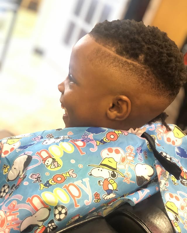 Kids curly top with skin fade